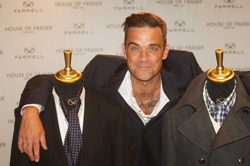 Robbie Williams annuncia quattro show live